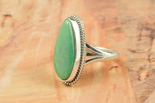 Genuine Crow Springs Turquoise set in Sterling Silver Ring. The Crow Springs Mine is located near Tonopah, Nevada. Created by Navajo Artist Bobby Piaso. Signed.